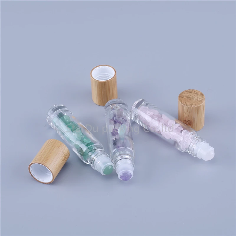 480 unids/lote, botellas roll-on de vidrio de masaje esencial transparente recargables de 10ml con bolas de rodillo de Jade de colores, grava en el interior