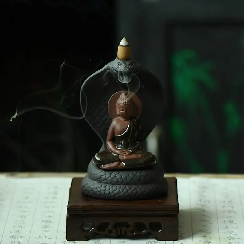 

Serpentine Flow with Buddha Design, Incense Furnace, Capturing, Reverse Smoke, Tranquil Ambiance, Unique