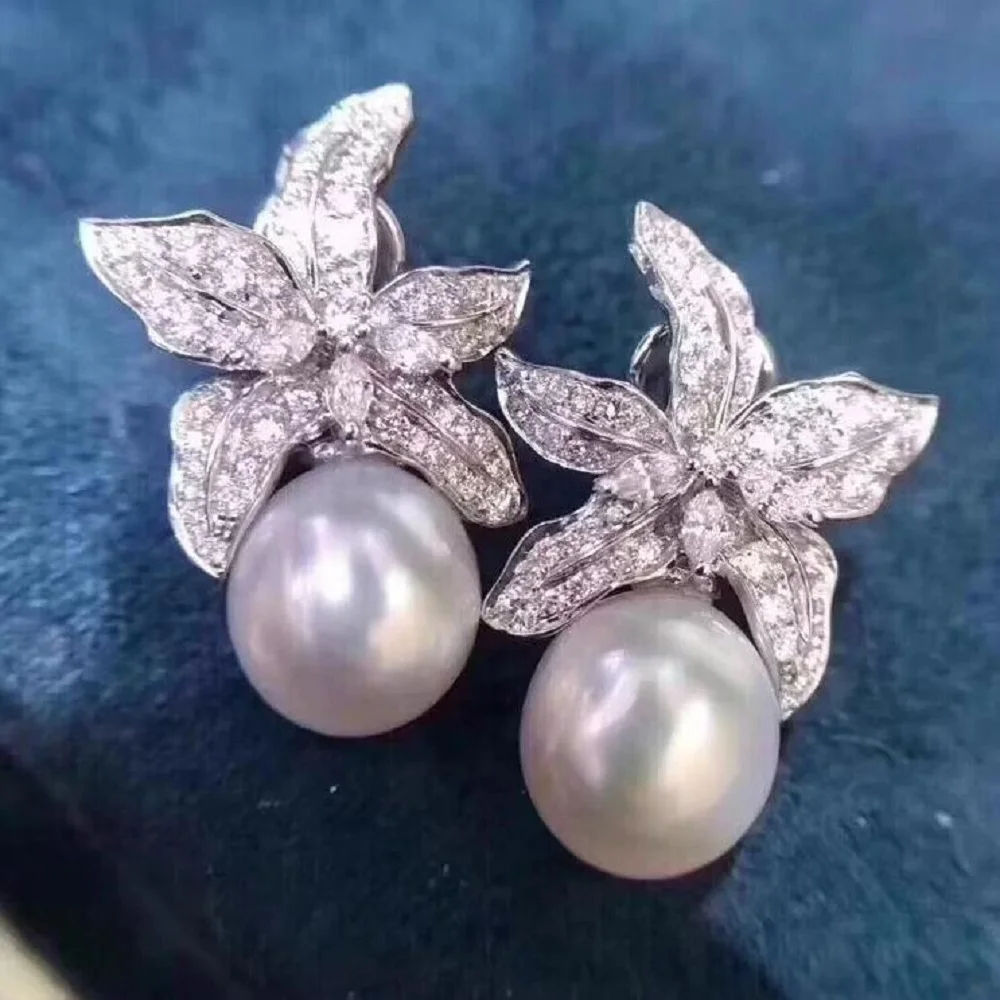 AAA 9-10mm10-11 ملم أقراط اللؤلؤ الأبيض لبحر الجنوب الطبيعي 925s