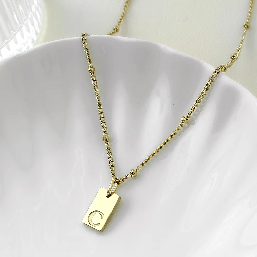 26PCS golded stainless steel minimalist style women's necklace with 26 initials square niche pendant jewelry wholesale