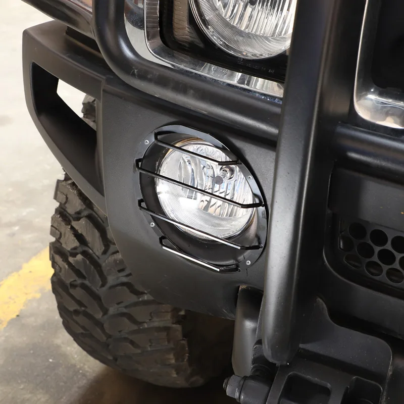 

Защитные аксессуары для автомобиля Hummer H3 2005-2009 годов выпуска, черные защитные накладки на противотуманные фары из углеродистой стали, защитные накладки на передние противотуманные фары.