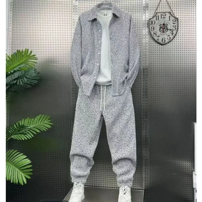 The New Autumn Casual Set for Men Features A Contrasting Color Striped Lapel Long-sleeved Top and Loose Casual Wide-leg Pants
