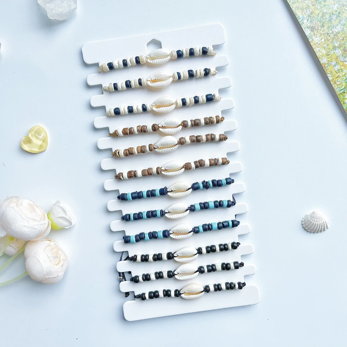 Pulsera de cuentas de cáscara de coco multicolor de concha de 12 piezas Pulsera de amistad de estilo hawaiano de playa de verano a la moda