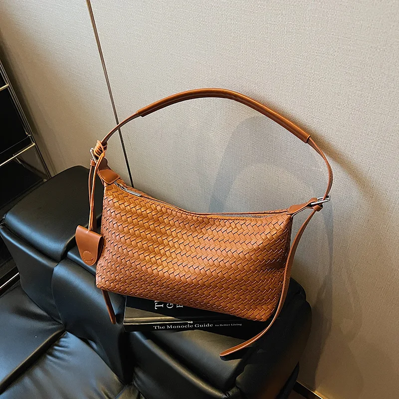 

2025 Новая большая сумка для женщин. Минималистичная дизайнерская роскошная сумка с тканым узором. Универсальная сумка через плечо. Стильная и стильная.