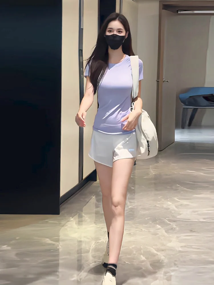 2025年フィットネスファッションスポーツウェアラウンドネックセーターとパンツのセット、スリムで若々しい印象の女性用カジュアルウェア