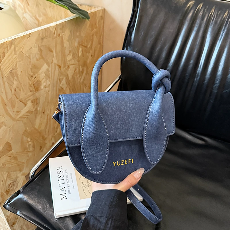 

2025 Women's Spring Bag - Textured Niche Small Round Bag, Contrast Color, Elegant Shoulder/Crossbody