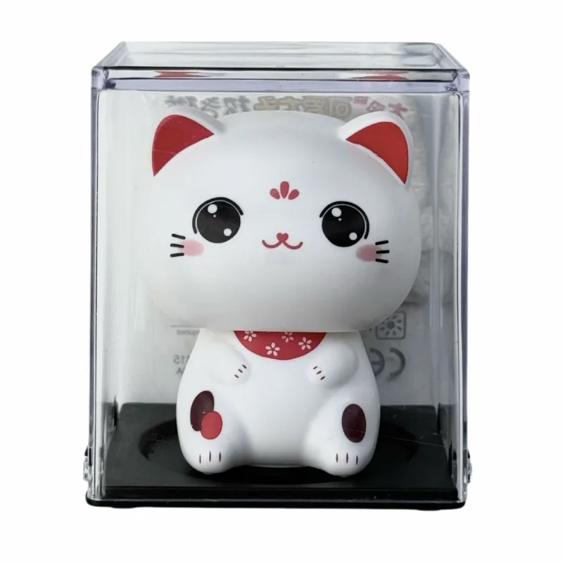 Solar energy big head white cat lucky cat cute mini auto-nodding cat car decoration gifts home toys are rolling in money.