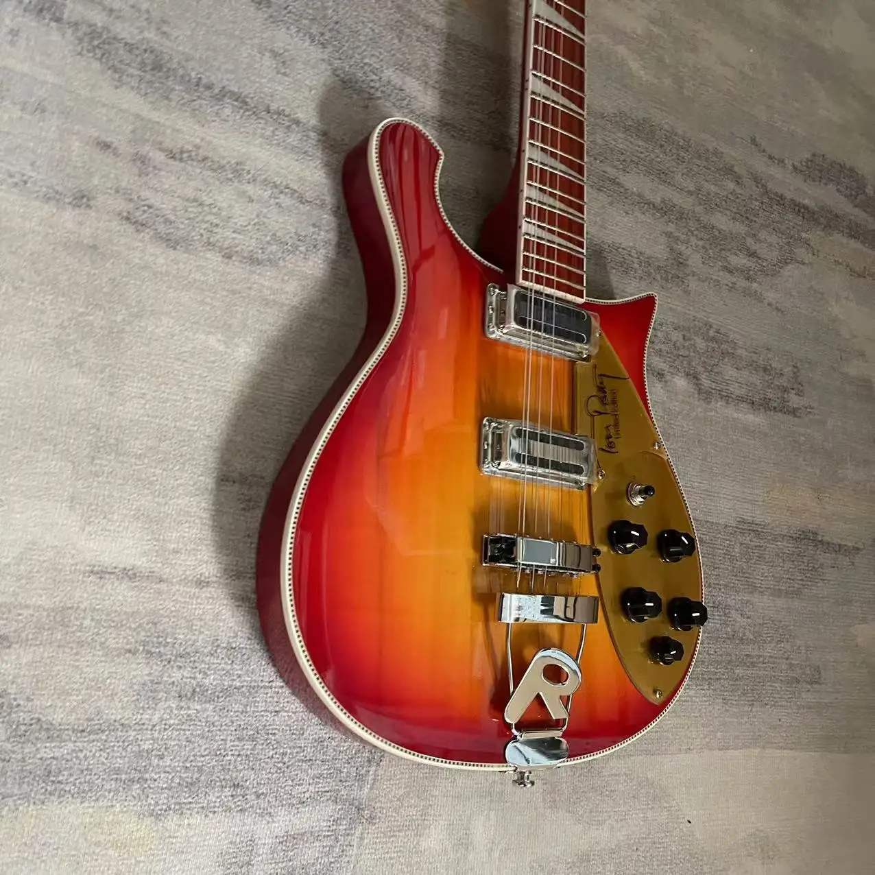 Special shaped electric guitar with tomato colored body, factory's actual shipping pictures, and inventory available. Order and