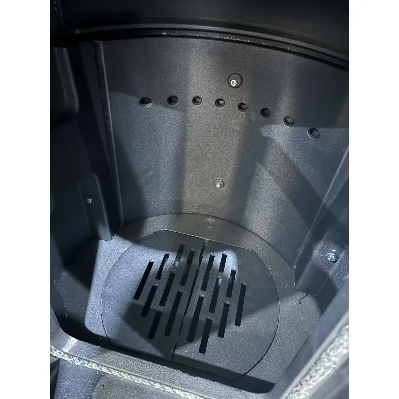 R1003A Stufa a legna rotonda per riscaldamento interno in ghisa durevole con stoccaggio dei tronchi (prezzo non include tubo)