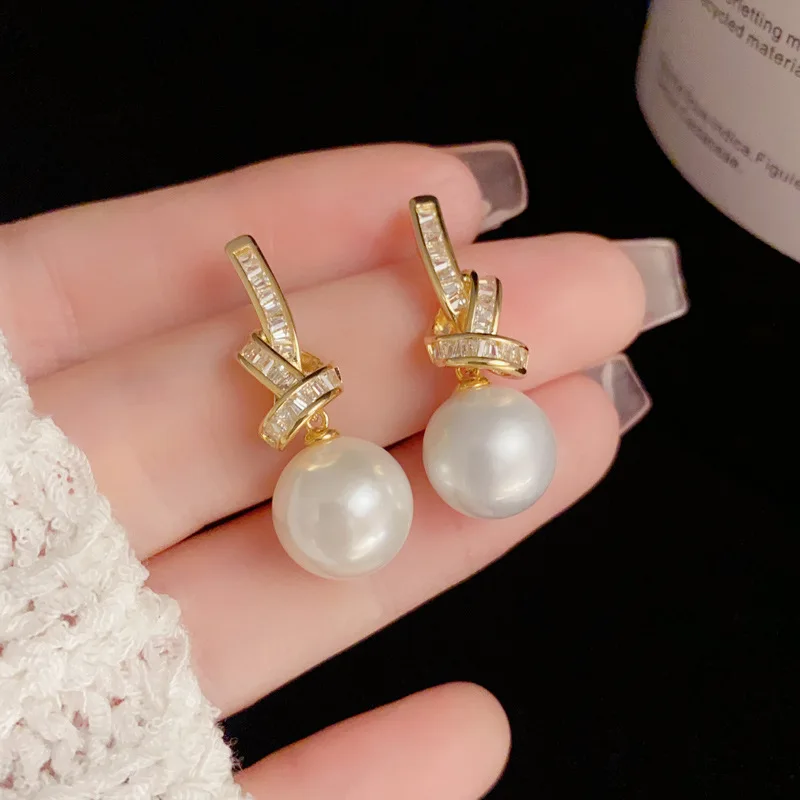 Light Luxury Micro Inlaid Zircon Knotted Pearl 925 Silver Needle Exquisite and Fashionable Super Sparkling Earrings