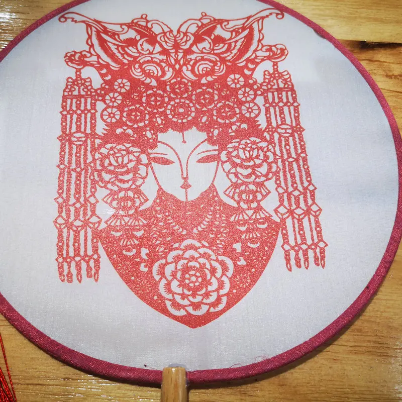 

Chinese Paper Cutting Beauty Pattern Silk Fan With Tassels Design Peking Opera Mask Pattern Moon-Shaped Dancing Fans Oriental