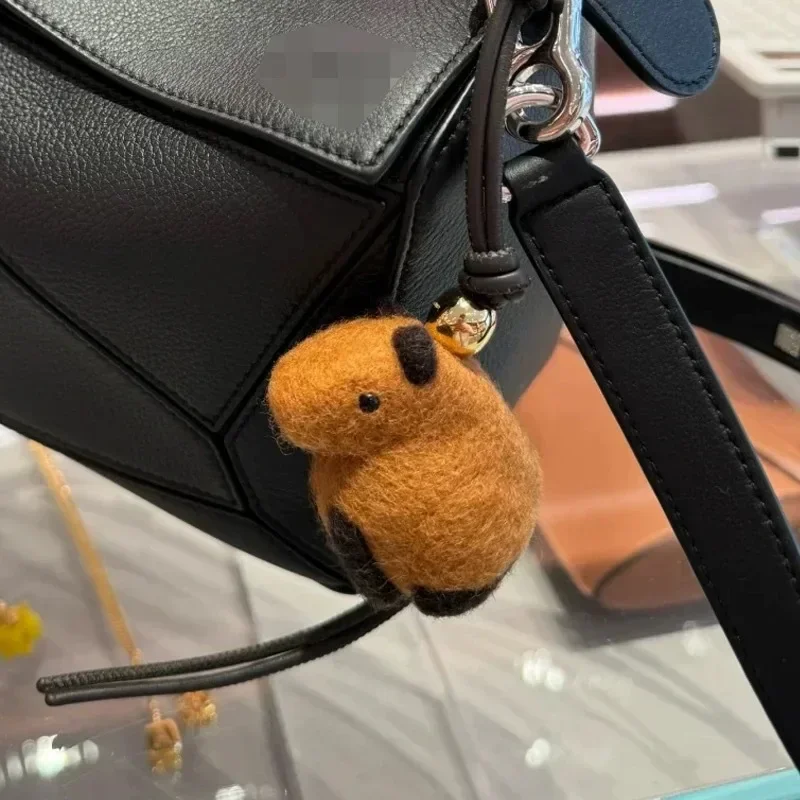 

Модная сумка-подвеска, брелок из металлической кожи, тренд 2024, новый дизайн, Sense Light, роскошный креативный брелок премиум-класса