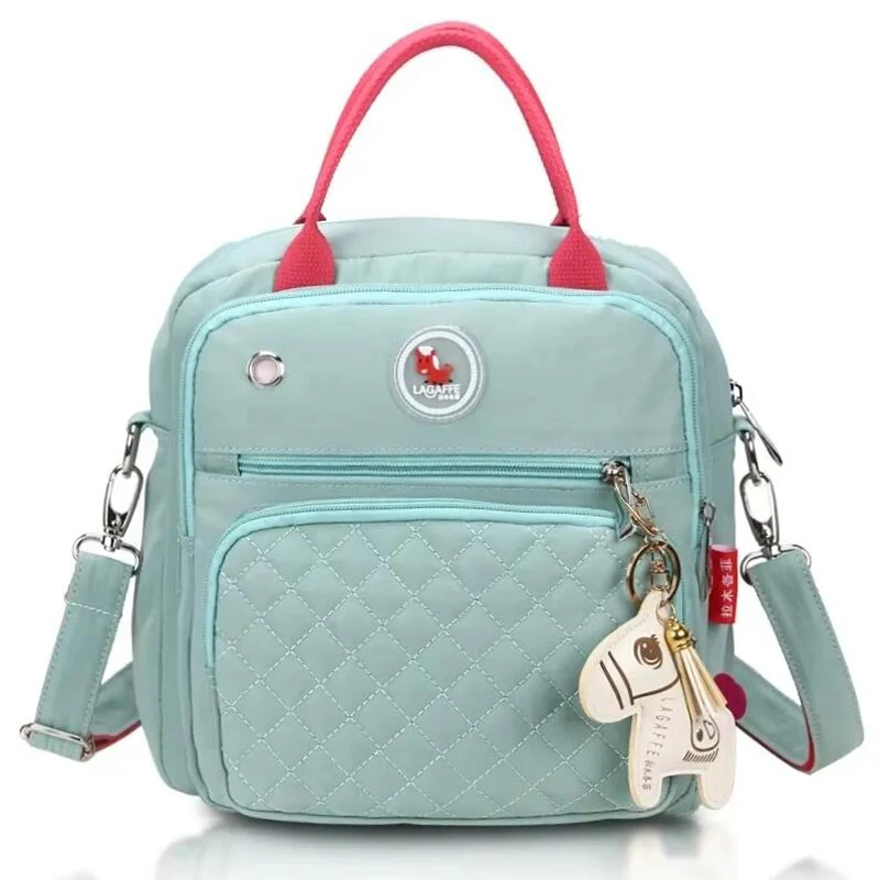 

High Quality Modern Fashion Mom Bag Solid Color Waterproof Canvas Outdoor Shoulder Bag Big Space Baby Diaper Bottle Storage Bag