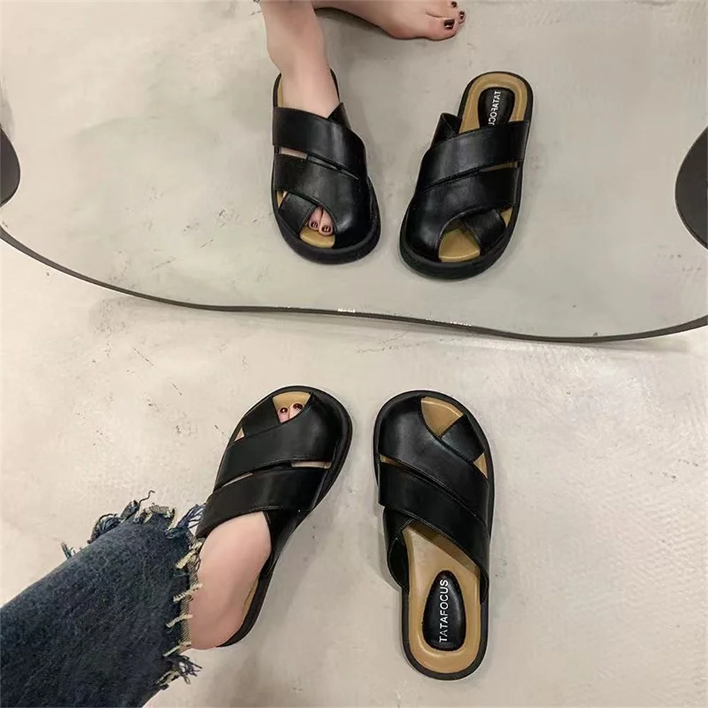 Baotou semi-slipper women wear pregnant women in summer, lazy people pedal office, Roman woven hollow muller shoes sandals.