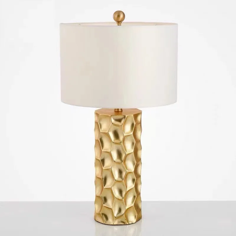 Modern simple and creative hardware resin gold table lamp American bedroom American bedside model room table lamp