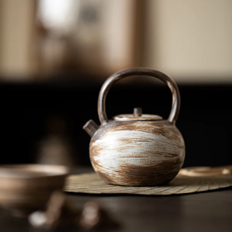 Handmade rough pottery retro round moon lifting beam teapot Japanese style minimalist powder steeping teapot household Kung Fu t