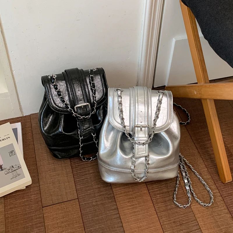 Mochila pequeña de lujo de cuero PU, bolso cruzado para adolescentes, bolso escolar, bolso de hombro plateado a la moda, mochila antirrobo para mujer