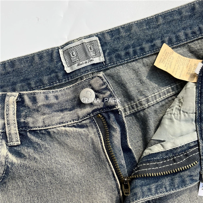 Hole CAVEMPT C.E Jeans Men Women 1:1 Best Quality Niche Washed Zipper Cav Empt Jeans Trouser