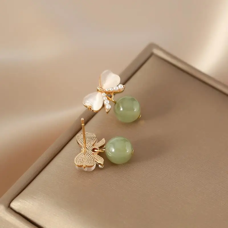 Pendientes de mujer con temperamento de Jade Hotan Natural seleccionados, joyería Retro Simple