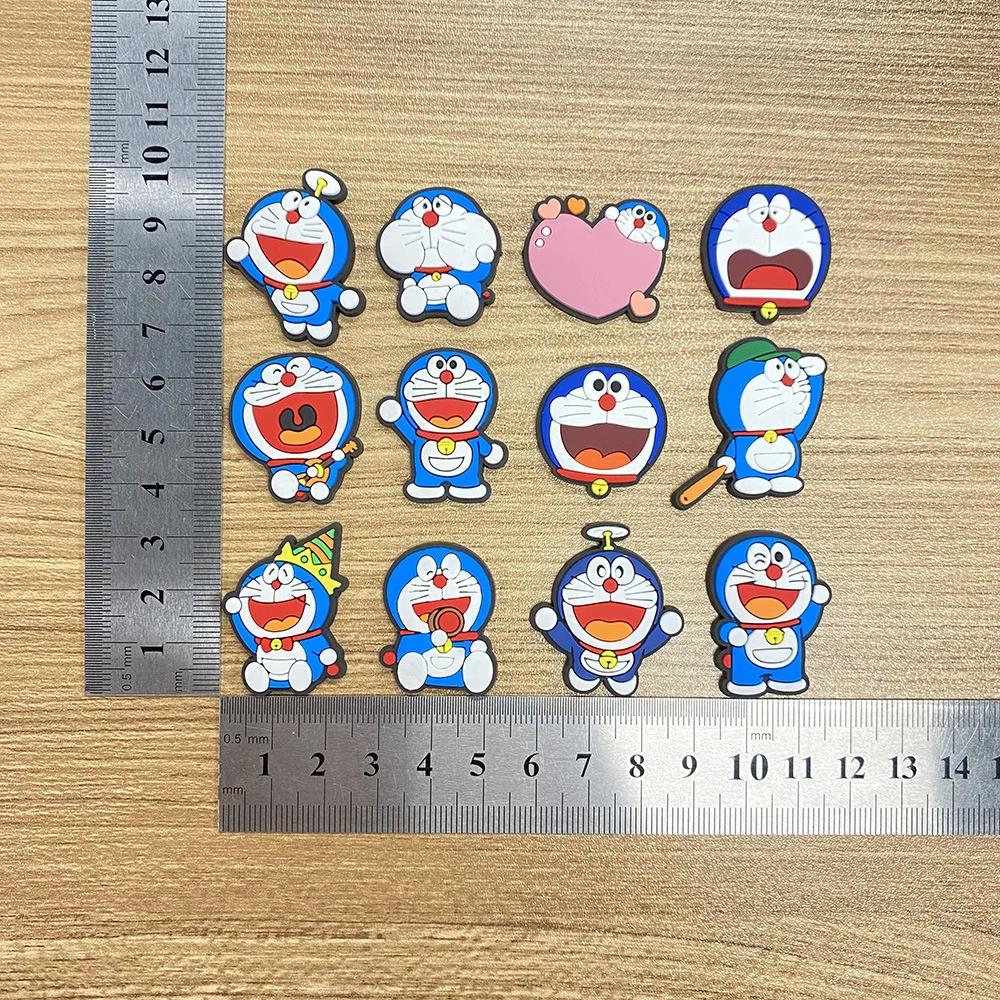 12 個かわいいスーパーロボット猫漫画靴チャームアクセサリー子供靴の装飾フィットリストバンド下駄サンダル子供クリスマスギフト