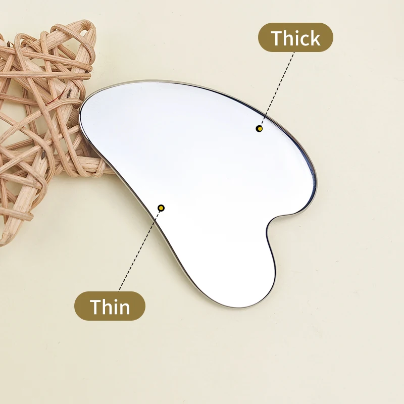 เครื่องขูดรองพื้นใบหน้าสแตนเลสรูปหัวใจแบบพกพาและใช้งานได้จริง 1 ชิ้นสำหรับการล้างเครื่องสำอาง