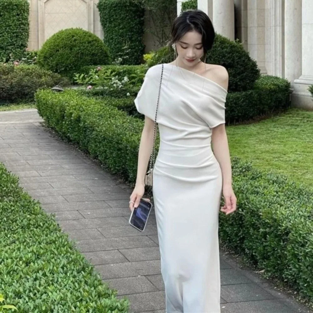 Lange schuine schouder lange jurk effen kleur off-shoulder slim fit lange rok Franse zoete beige abrikoos Koreaanse stijl jurk club