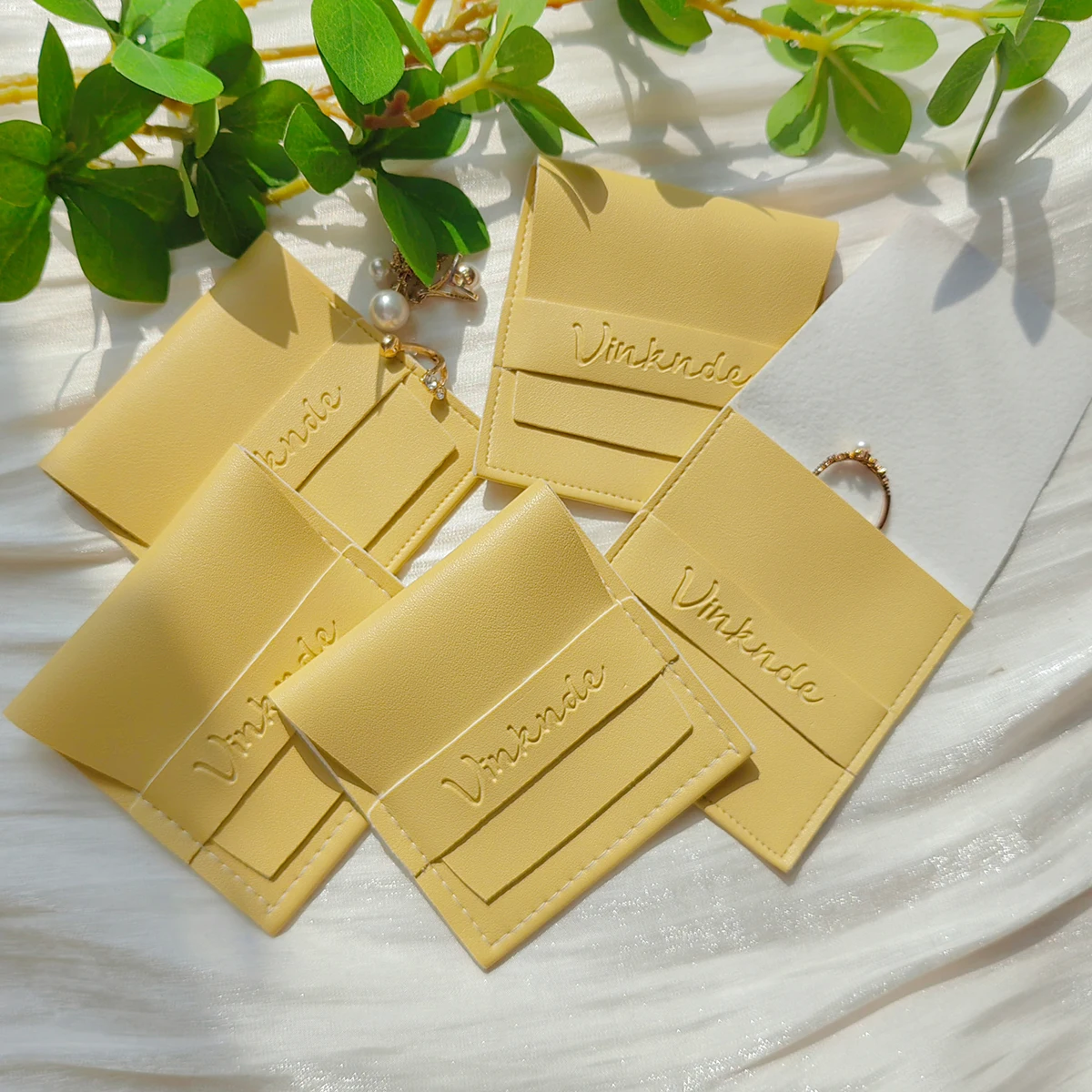 

Кожаный мешочек из ПУ-кожи на заказ, желтая замшевая сумка с логотипом для упаковки серег, колец, браслетов, бижутерии, контейнер для свадебных подарков