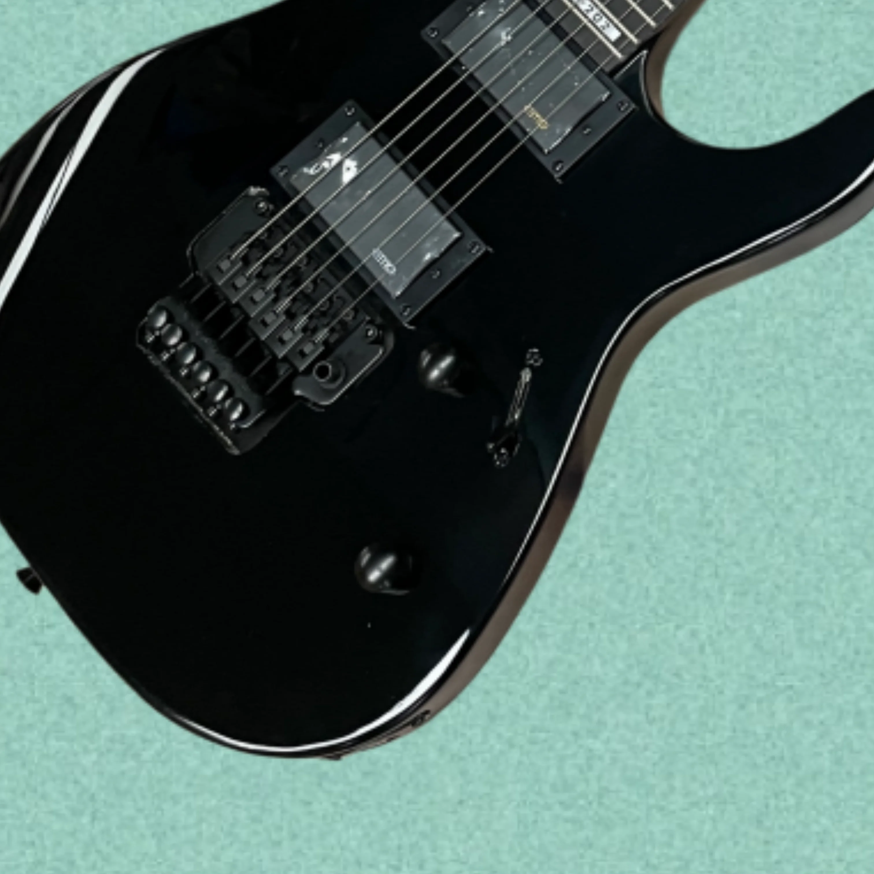 Solid black 6-string electricguitar with rosewood fingerboard and active pickups guitars,a high-value stage performance guitarra