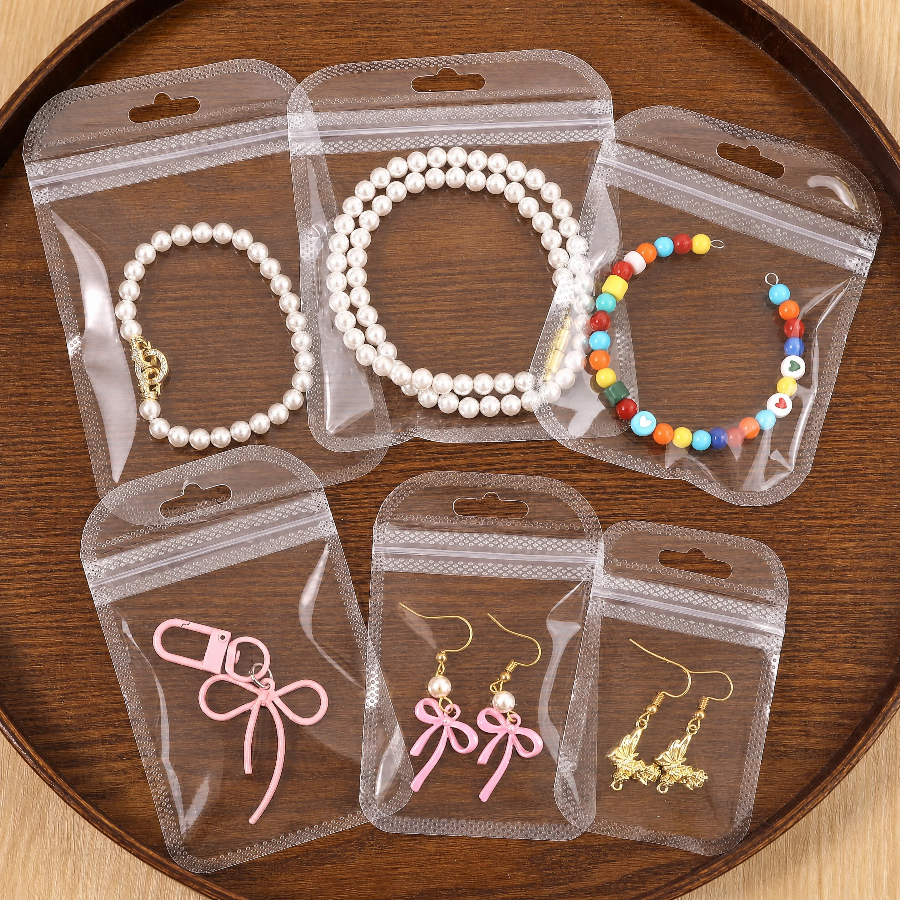 50Pcs Multi-size PP Clear Zip Lock Bags with Hang Hole Round Corner Reusable Pouches for Trinkets, Gift Storage/Packing/Display