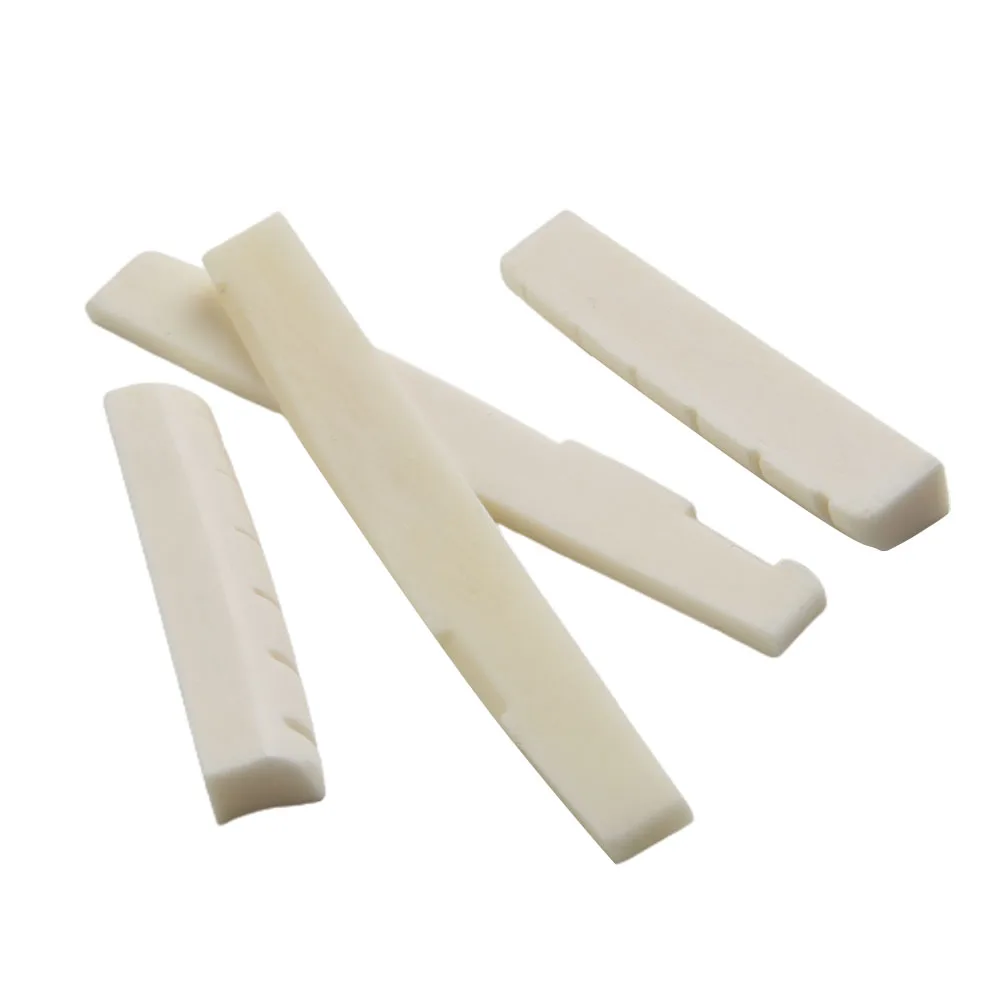 Experience Improved Sound Quality with 4 Pcs of Bone Guitar Saddle and Nut Suitable for 6 String Acoustic Guitars