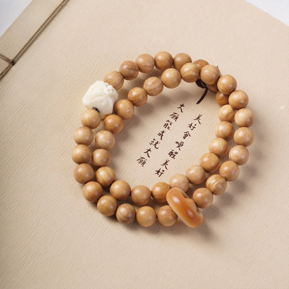 

New Chinese-style Papuan milk-scented wood lion-dancing running ring bracelet Wenwan bracelet Buddha bead handheld plate string.