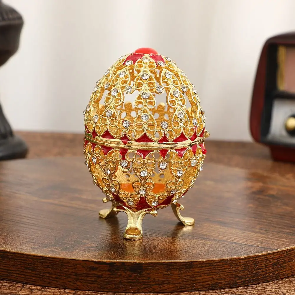 

Enamel Color Jewelry Box Alloy Material Hollow Design Egg-Shaped Box Inlaid Gem Inlaid Diamond Storage Jar Earrings Storage