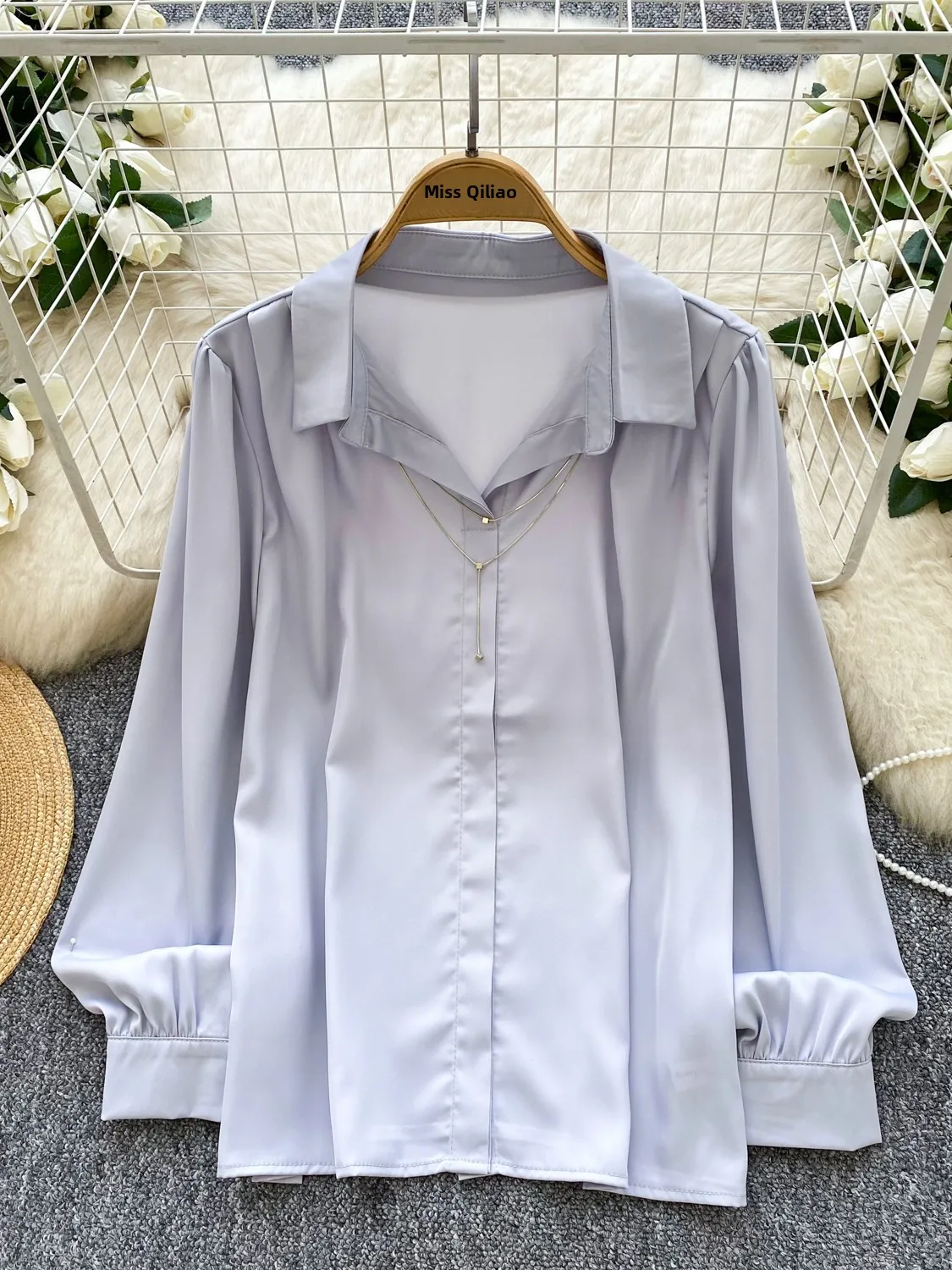 カジュアルな長袖スリムフィットポリエステル繊維の女性用ルーズフィットスリムフィットトップス、2025年秋ファッショントレンド