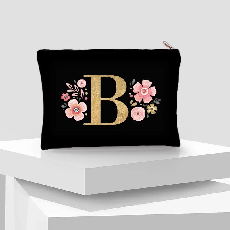 Poudres cosmétiques noires initiales florales, sacs de rouge à lèvres de demoiselle d'honneur de voyage, cadeau d'enterrement de vie de jeune fille, pochette de maquillage légère de luxe