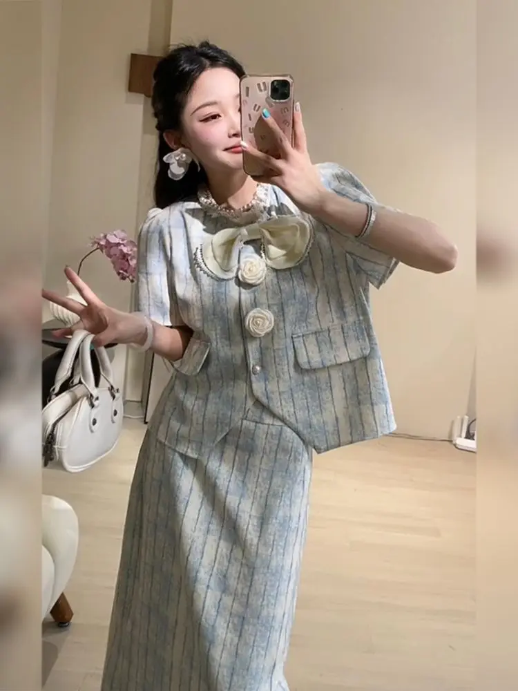 

2025 New Summer High-end Elegant Style Designed Advanced Niche Temperature Bow Top + Long Skirt 2 Piece Sets Womens Outfits