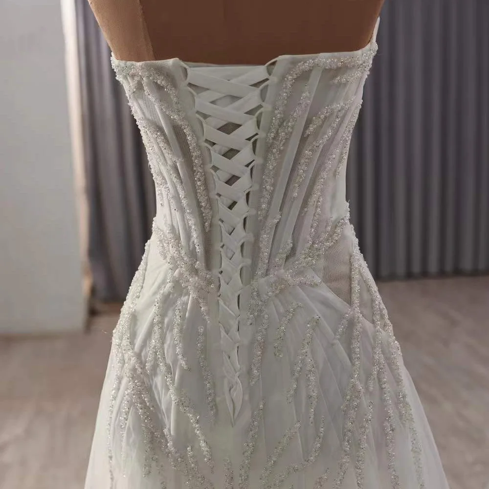 فستان زفاف من Fساتين زفاف بدون حمالات مطرز بالكريستال بدون أكمام وأربطة من الخلف فستان زفاف مثير