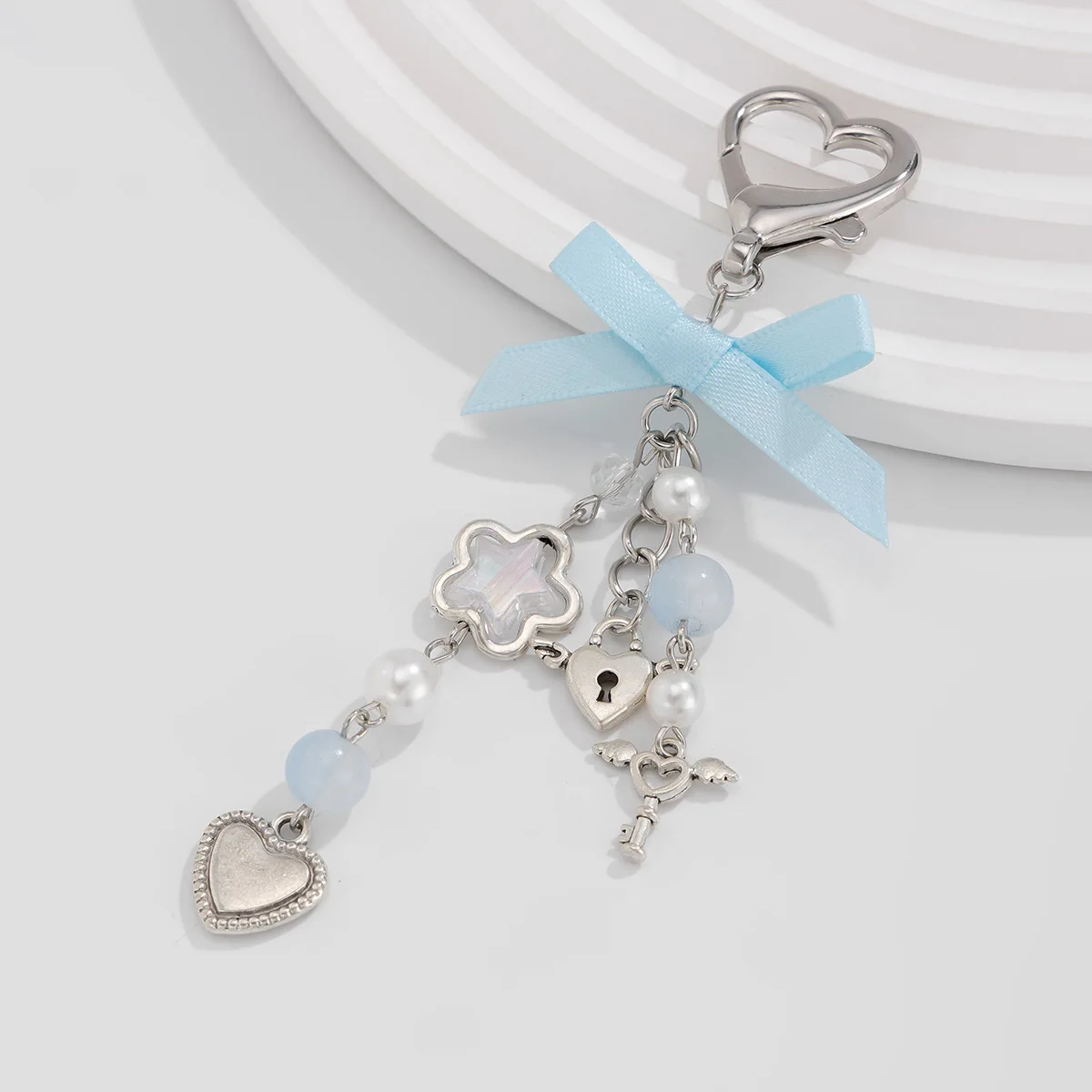 Süßer und schöner blauer Schleife-Stern-Charm-Schlüsselanhänger für Damen, modische Imitationsperle, Liebes-Herz-Anhänger, Schlüsselanhänger, Schmuck