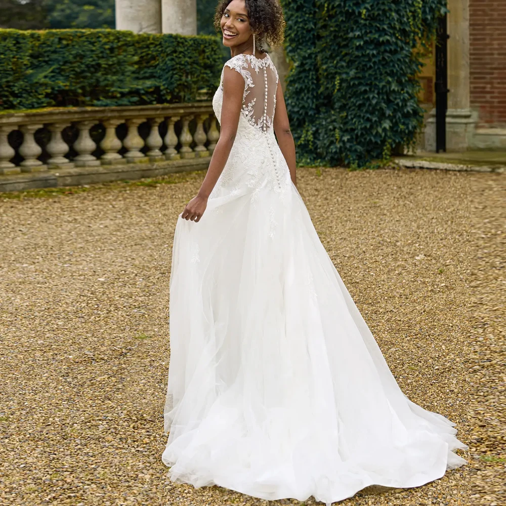 エレガントな V ネックのウェディングドレスワイドストラップブライダル成長アップリケレースイリュージョンカスタマイズ半袖 A ライン Vestidos デノビア