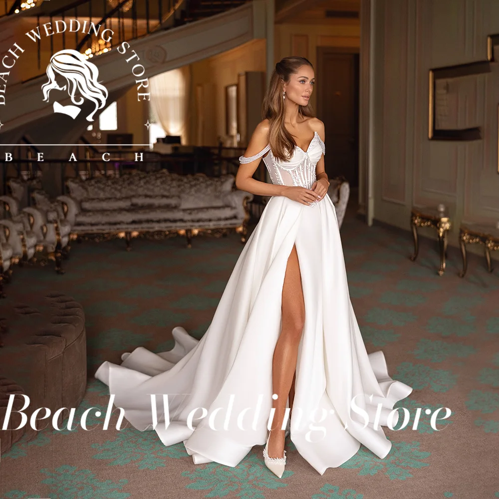Beach Off-Shoulder Sweetheart Neckline ภาพลวงตาเอว High Slit ชุดเจ้าสาวพร้อมรถไฟ Elegant Modern ชุดแต่งงานที่กําหนดเอง