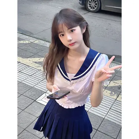 자세히 둘러보기 한국어 유니폼 뜨거운 여자 반팔 양복 여성 여름 2025 새로운 대학 스타일 해군 칼라 탑 JK Pleated 치마 투피스 세트