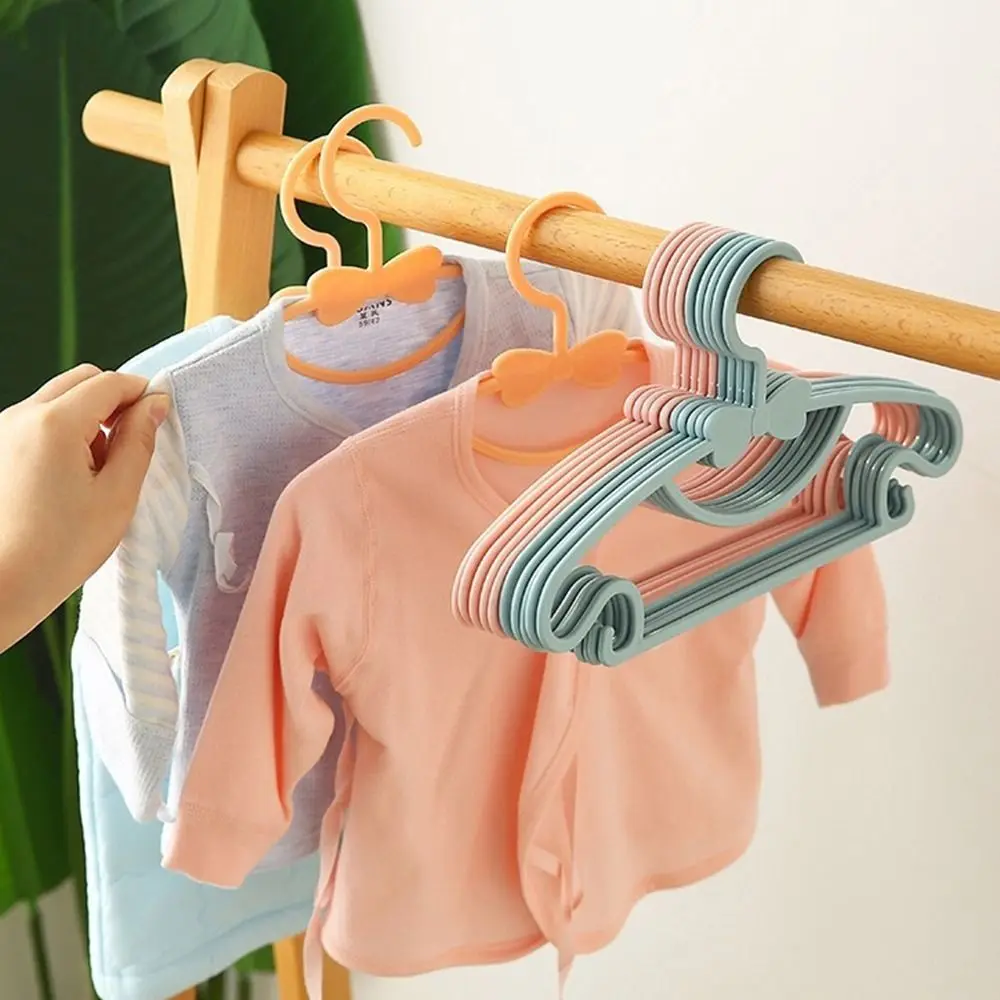 

30Pcs Plastic Material Baby Clothes Racks Portable Cute Bowknot Kids Clothing Hangers Durable Non Slip Closet Organizer Home