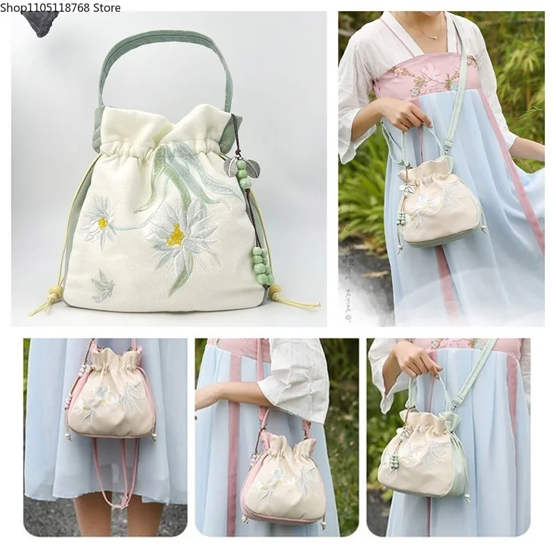 

Сумка через плечо с вышитым цветком и съемной сумкой-ведром на шнурке