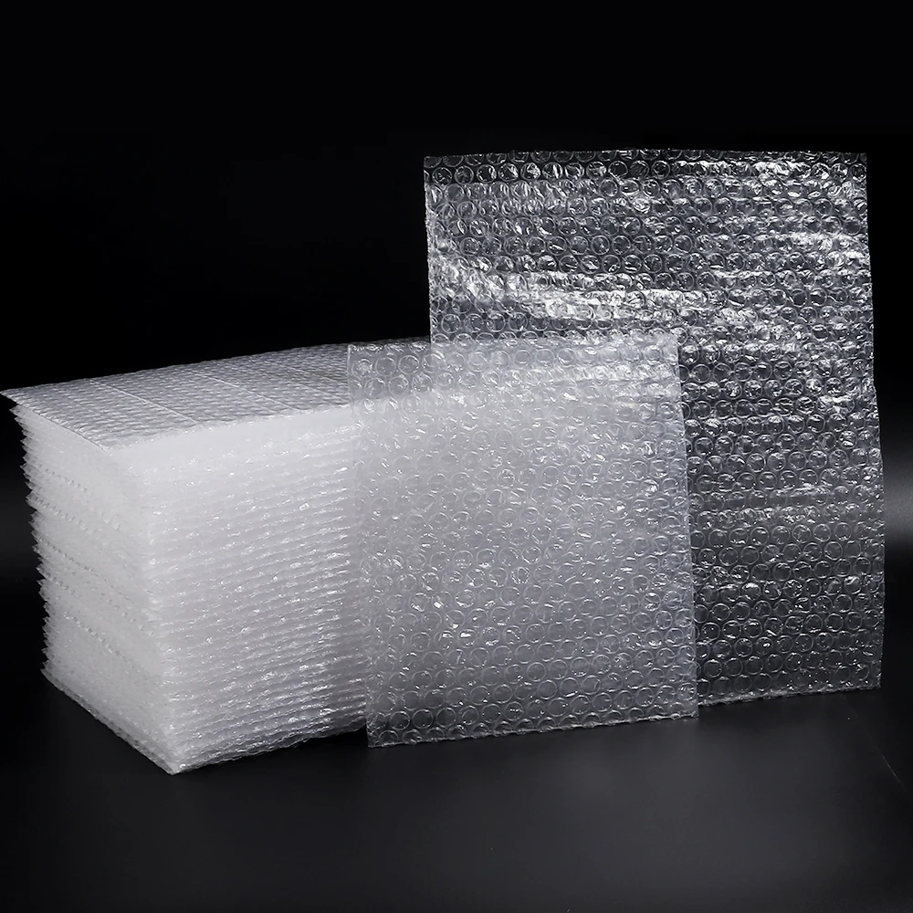 10-30pcs / lote cubiertas de amortiguamiento transparentes sobre paquete a prueba de golpes bolsa de burbuja blanca envoltura protectora bolsas de empaquetado de espuma