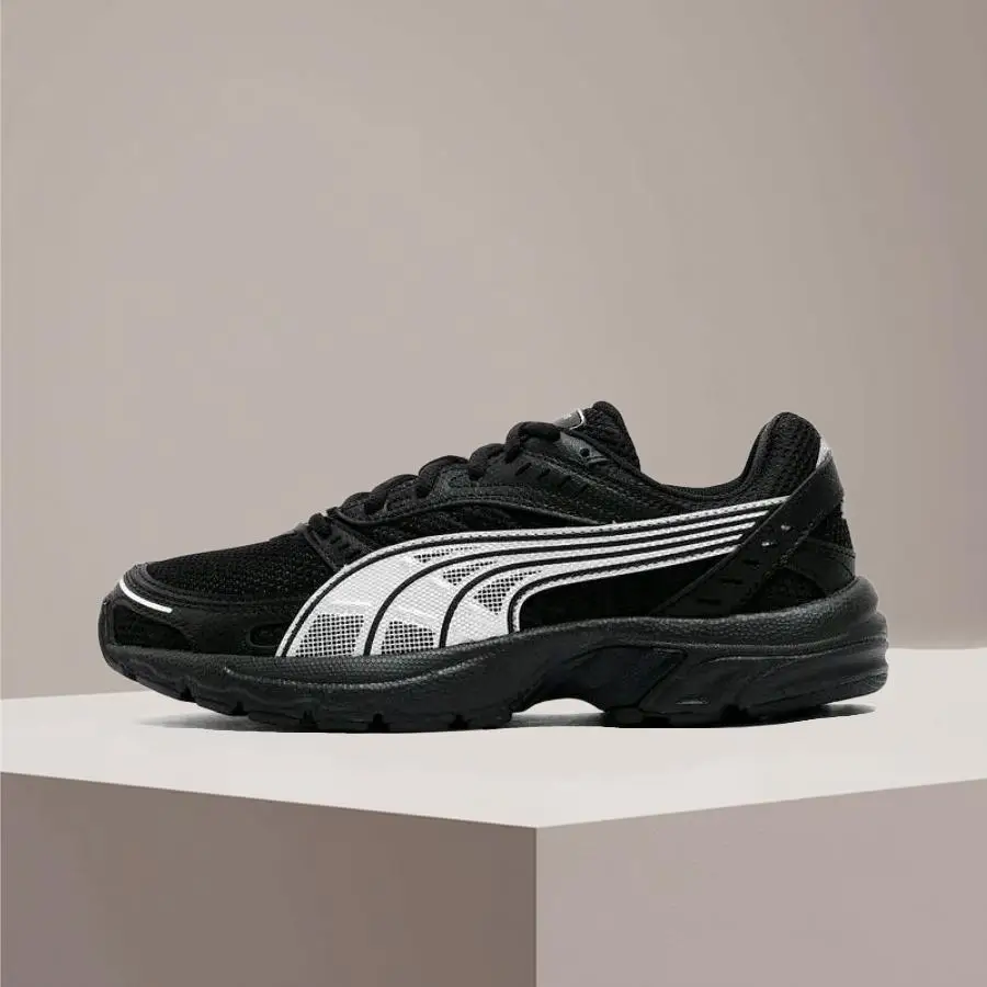 

PUMA Axis: Стильные, удобные и нескользящие низкие кроссовки для бега и повседневной носки (унисекс) – черные 368465-21