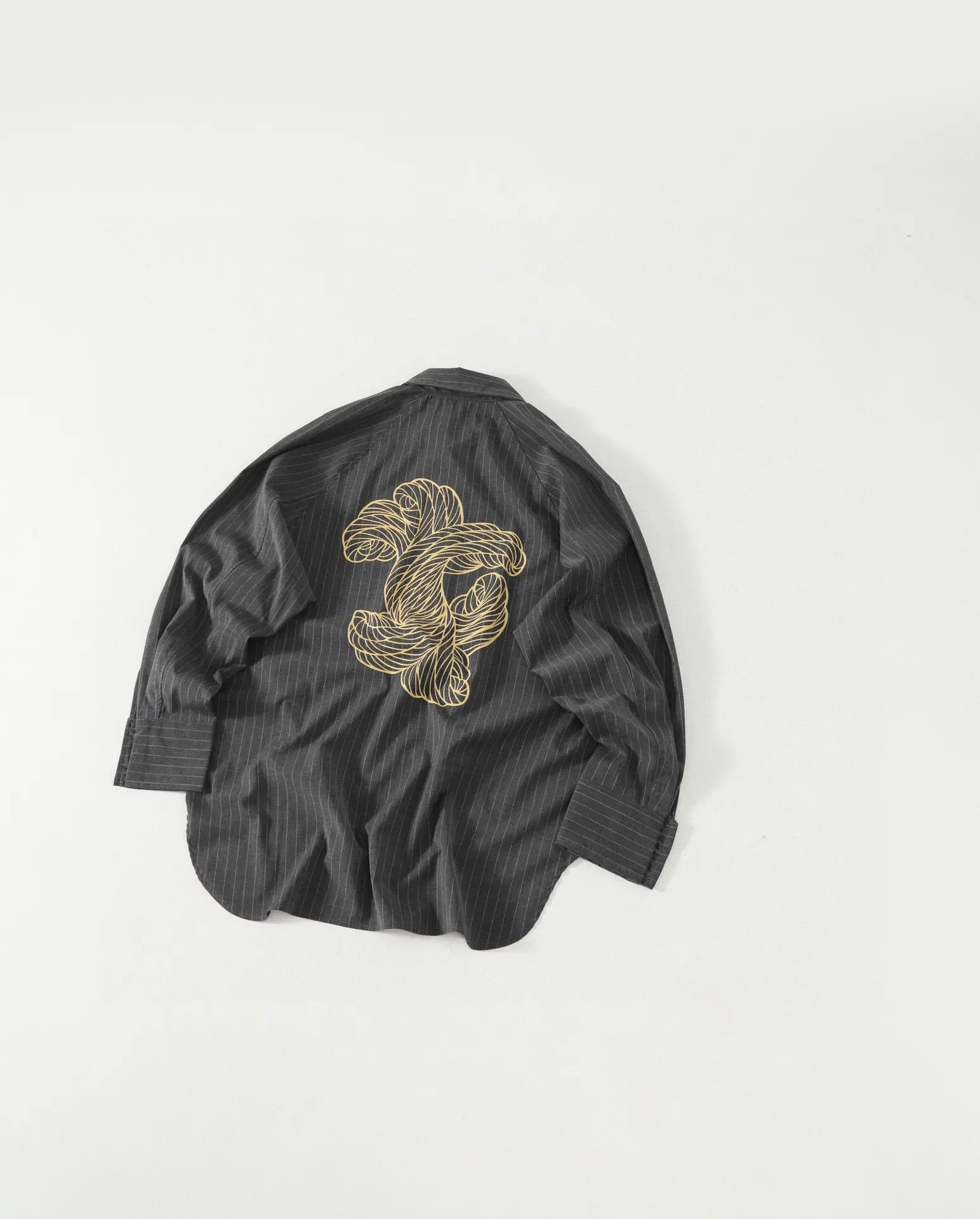 

Japanese niche knot print simple loose casual striped long-sleeved shirt