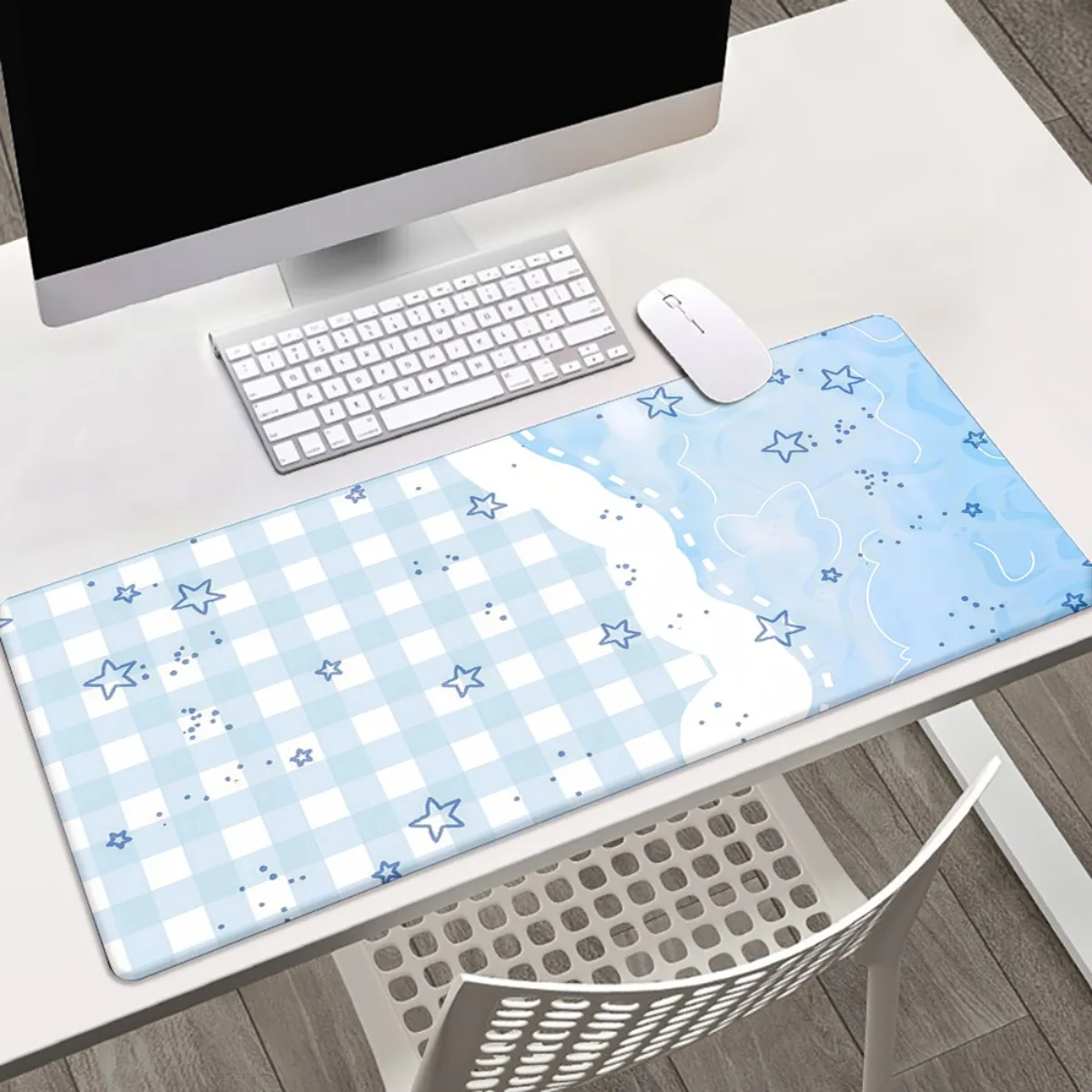 

The checkered and cloud-patterned mouse pad is a high-definition printed rubber anti-slip and washable desktop decoration