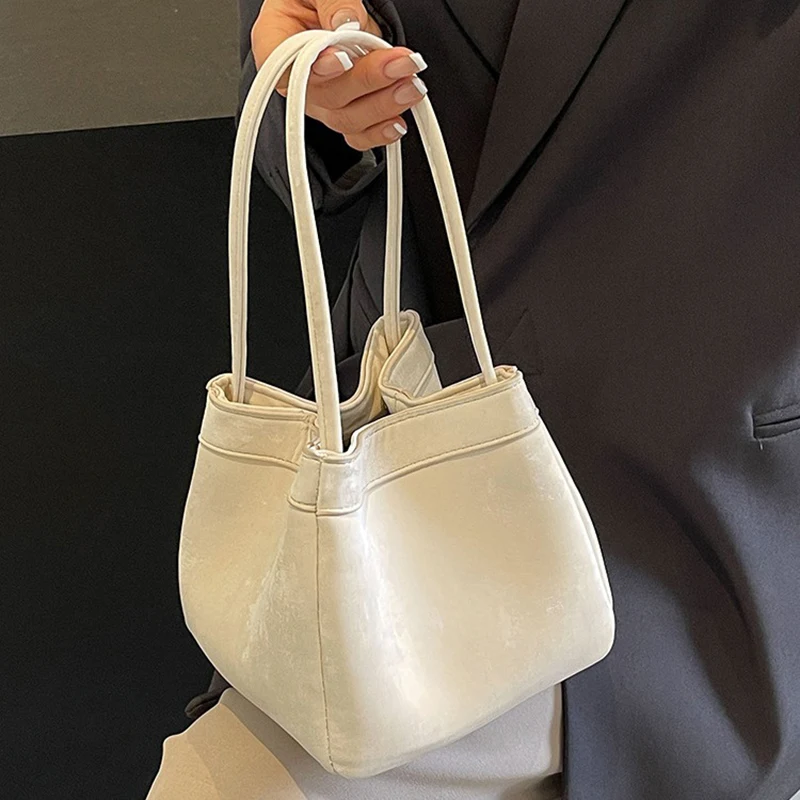 High-End Veelzijdige Emmertassen Voor Dames Zomer 2024 Nieuwe Niche Design Schouder Crossbody Tas Dames Woon-Werkverkeer Handtassen