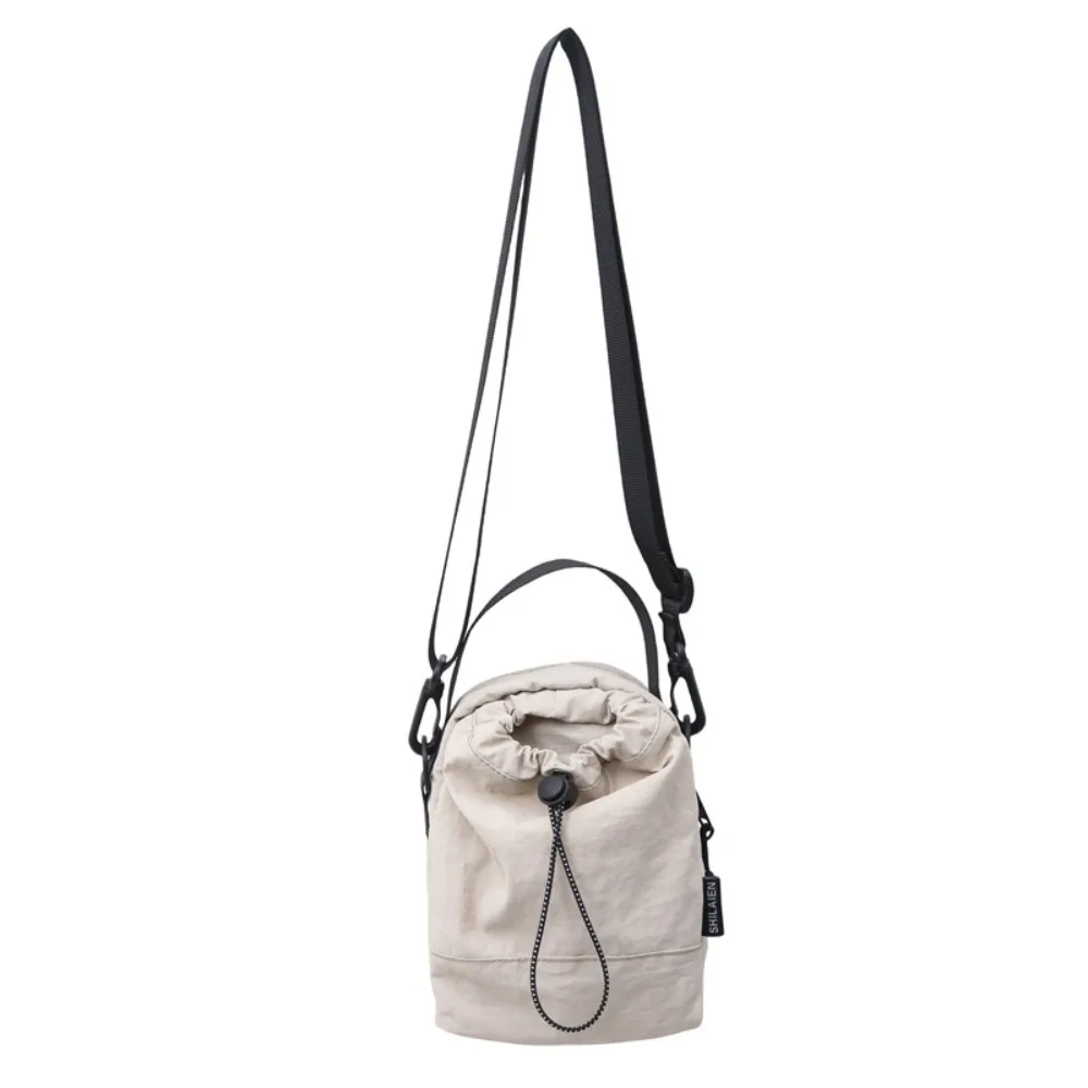 

Waterproof Sports Nylon Shoulder Bag Coin Pouch Solid Color Drawstring Crossbody Bag Korean Style Casual Mobile Phone Pack Daily