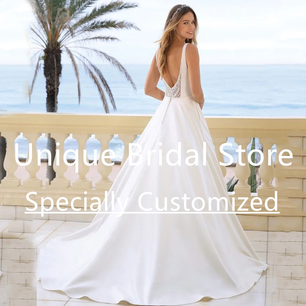 Customized UETTEY Satin Wedding Dress A-Line Deep V-Neck Sleeveless 2023 Lace Backless Button Women Draped Brush Train Vestido D