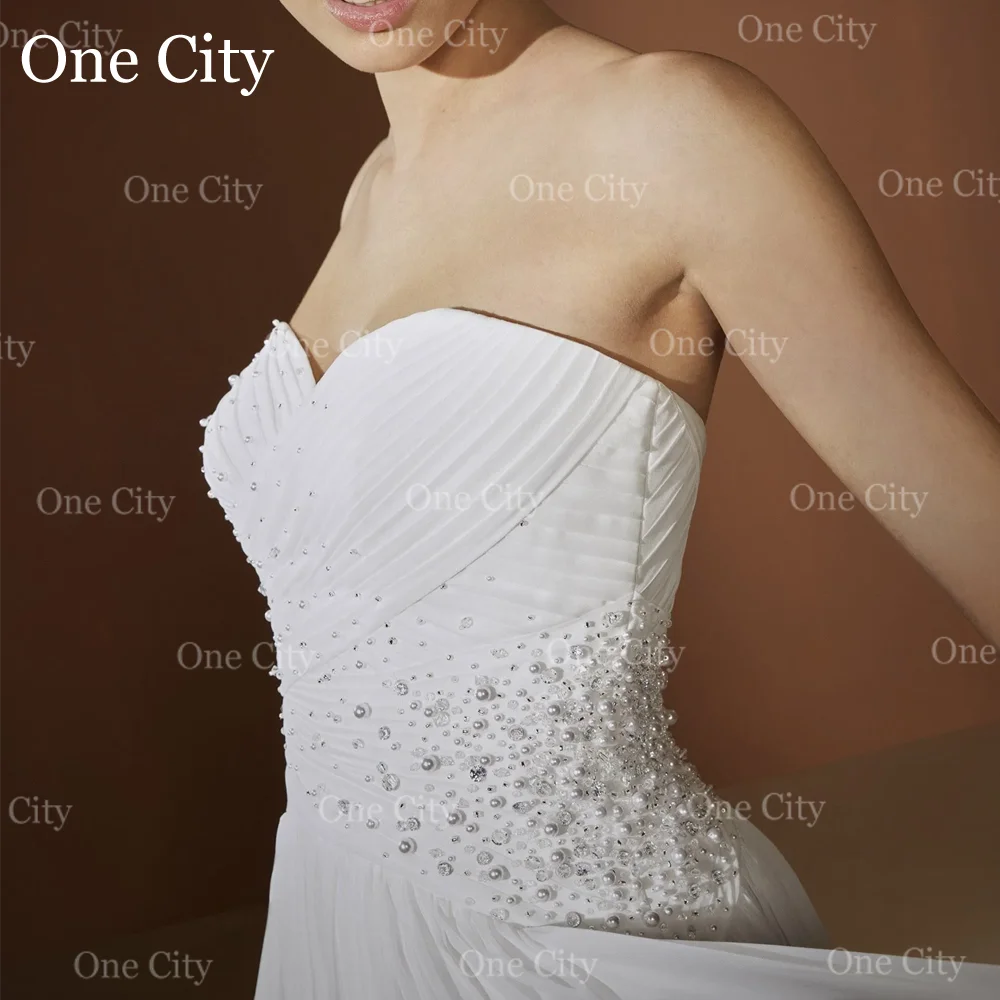 Novo branco frisado sem alças chiffon vestido de casamento com capa destacável a linha vestido de noiva sem mangas sem costas vestidos de noviaNovo Branco Beaded Strapless Chiffon vestido de noiva com Cape desmontável